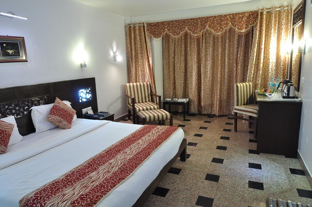 Hotel Venkatesh International Rāipur Szoba fotó